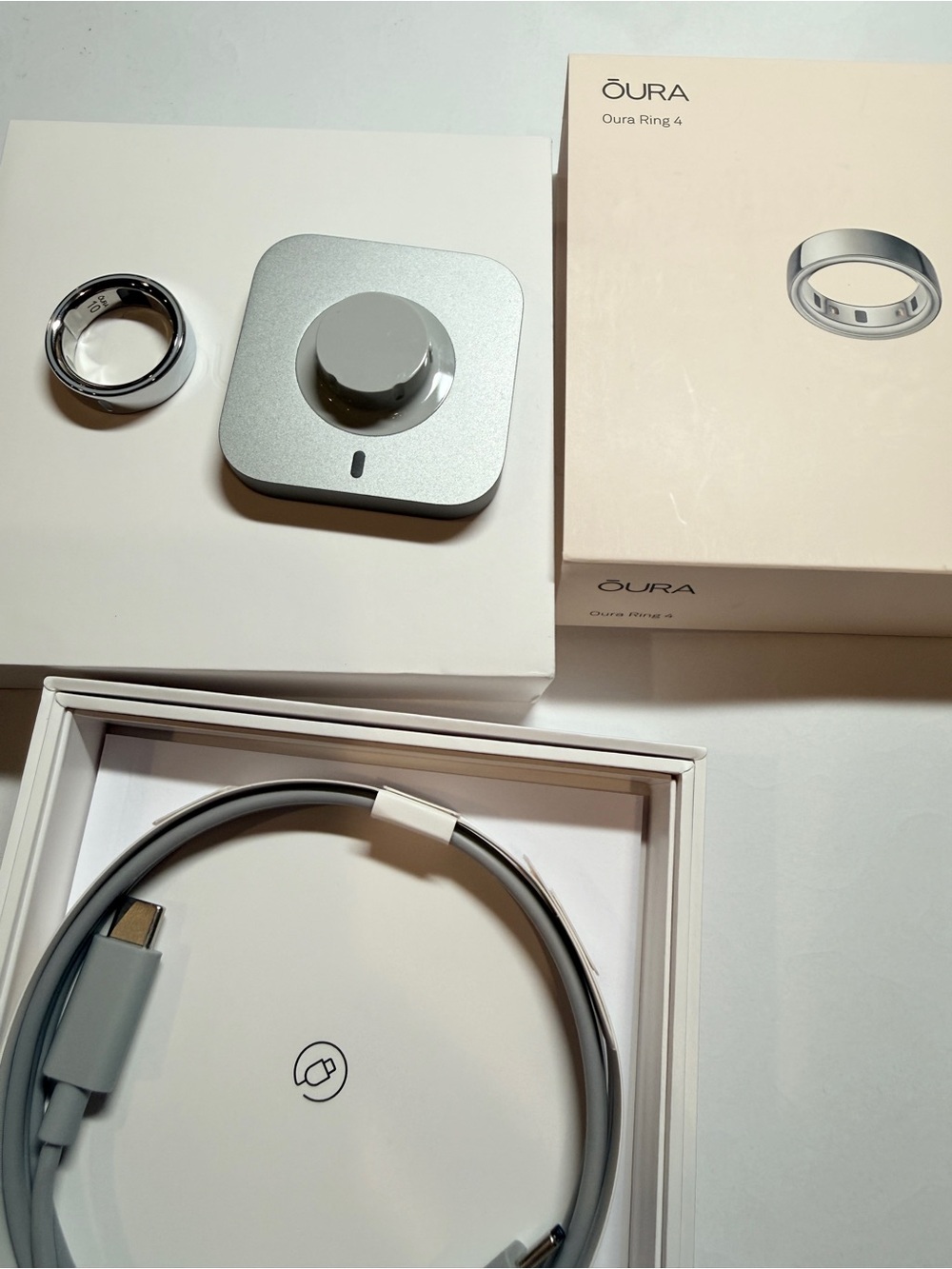 Silver Oura Ring 4, size 10 with original box and original charger and cable